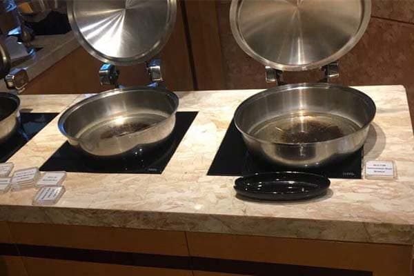 Invisible induction hob with wireless control ensuring precision and flexibility in cooking